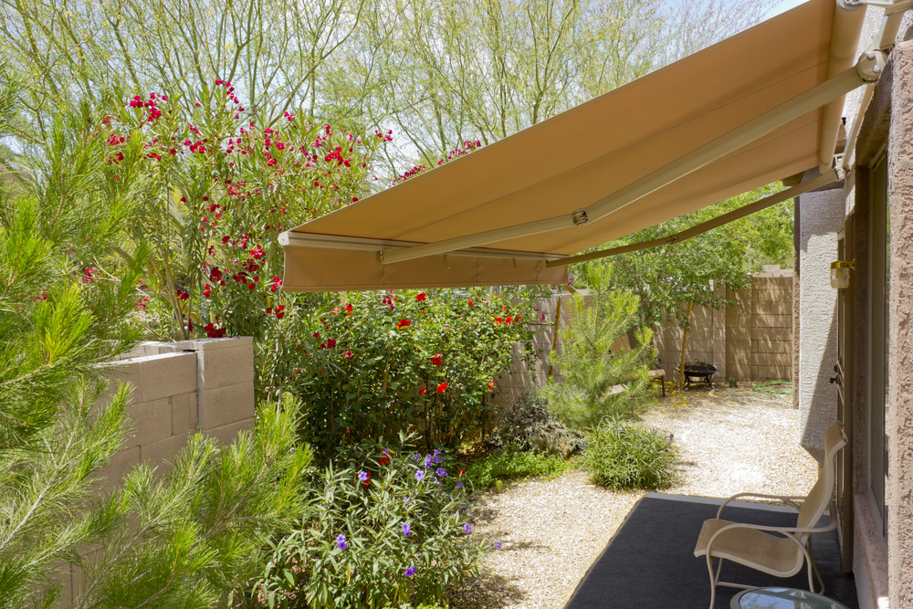 Arizona backyard with automatic retractable awning for extra