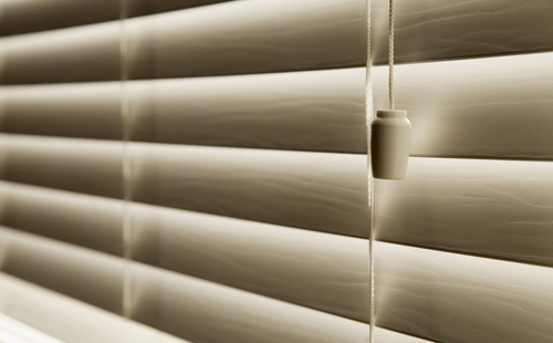 a close up image of White Slatted Blinds