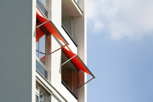 Image of retractable awnings on an apartment block by Shutters Australia