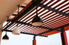 a picture of wooden awnings for homes used as a canopy of sorts